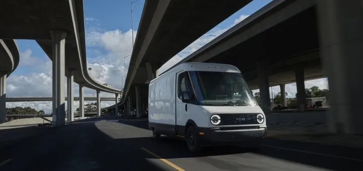 Two people moving boxes