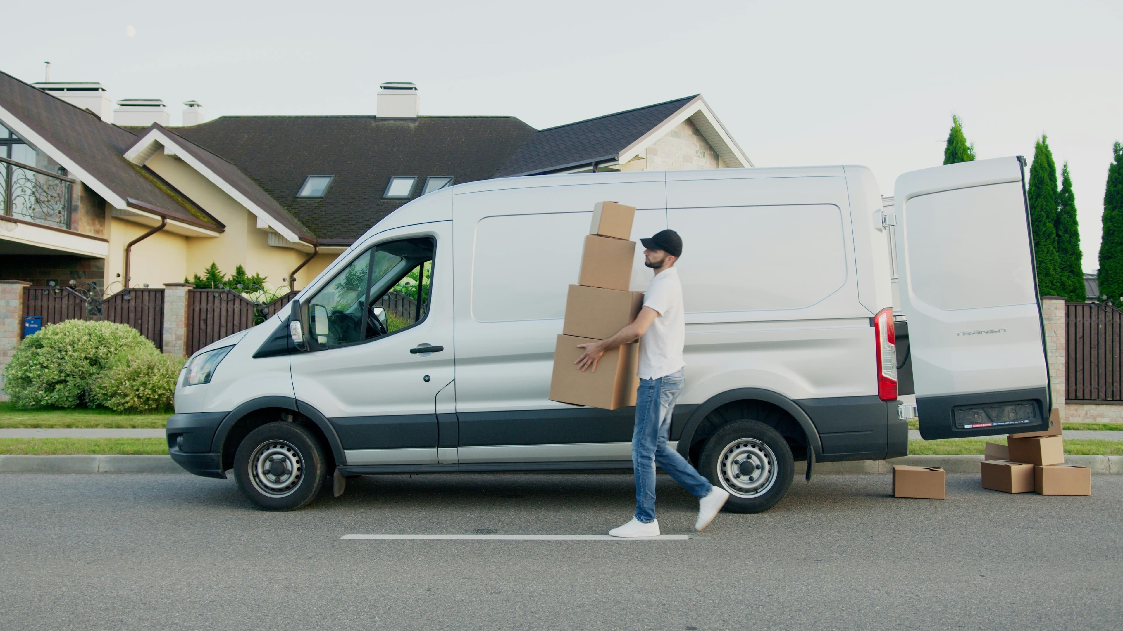 A delivery van on a residential street