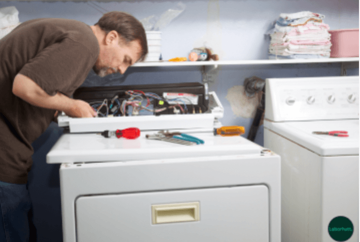 man reconnecting washer
